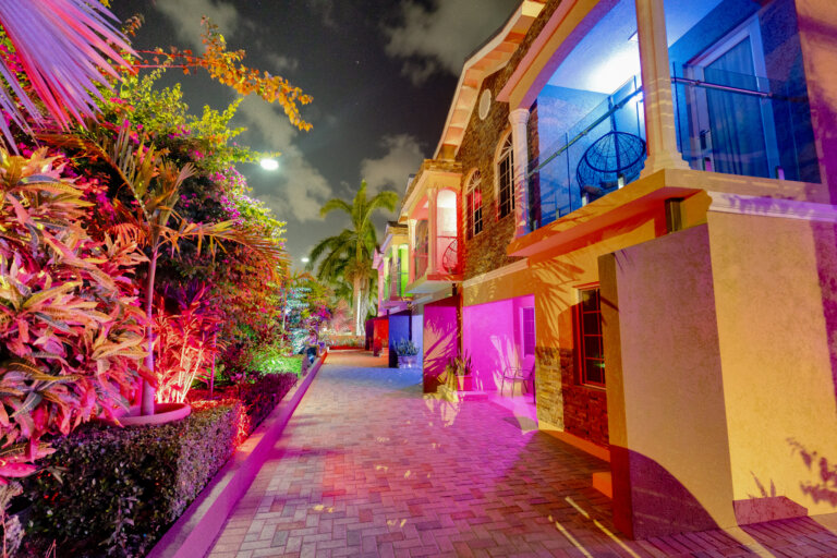 Nighttime Magic – The villa lights up beautifully after dark.